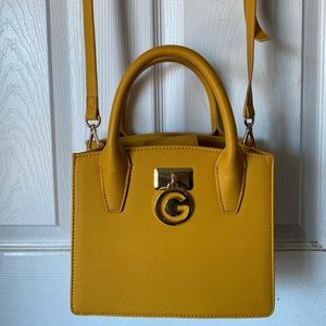 Mustard shoulder and wrist hand bag